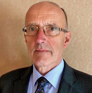 Portrait photograph of Lord Justice William Davis, Chairman